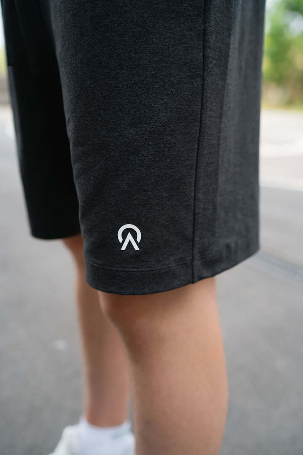 Black Re.Force Shorts featuring a sleek design and logo detail, perfect for athletic and casual wear.