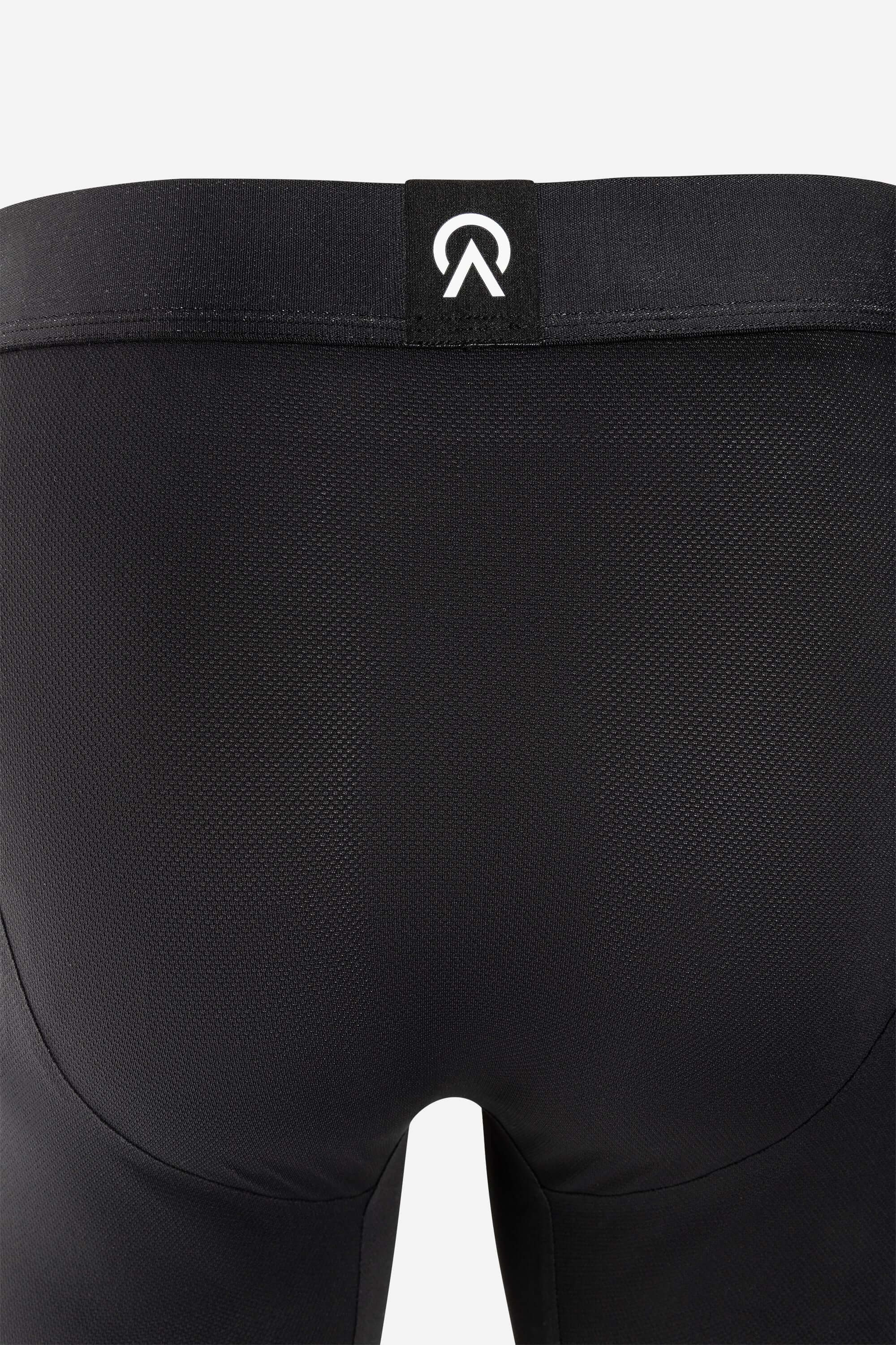 Back view of UNDS Boxer Briefs featuring a black elastic waistband and logo.