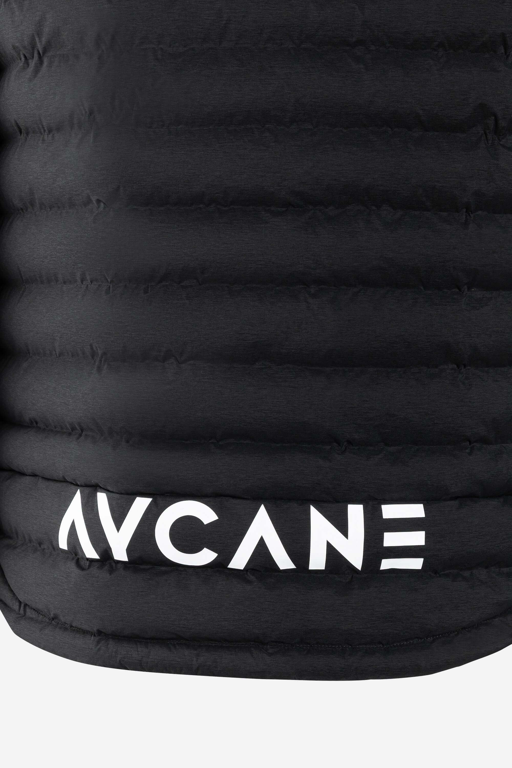 Close-up of T-Lite Jacket showcasing black seamless design and AYCANE logo for warmth and style.