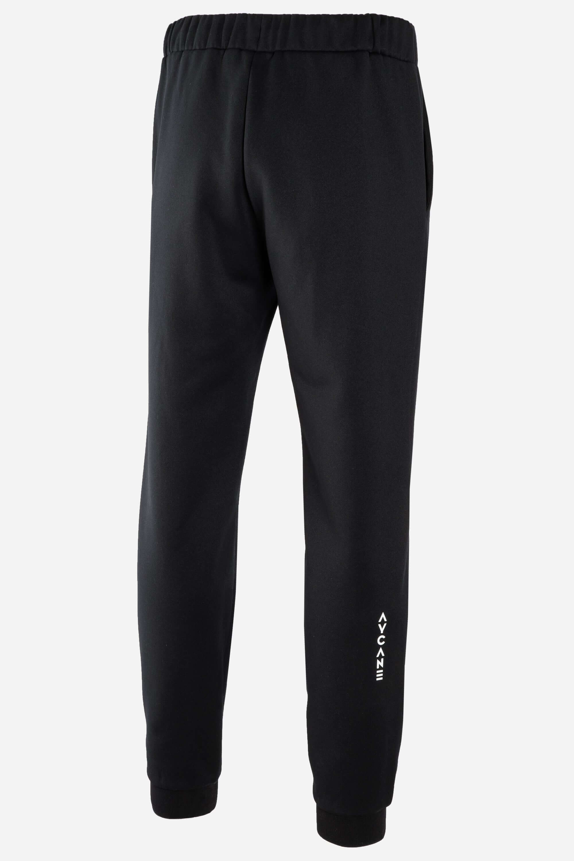 Squad Jogger Youth in black, featuring a relaxed fit and hidden zip pocket for comfort during activities.