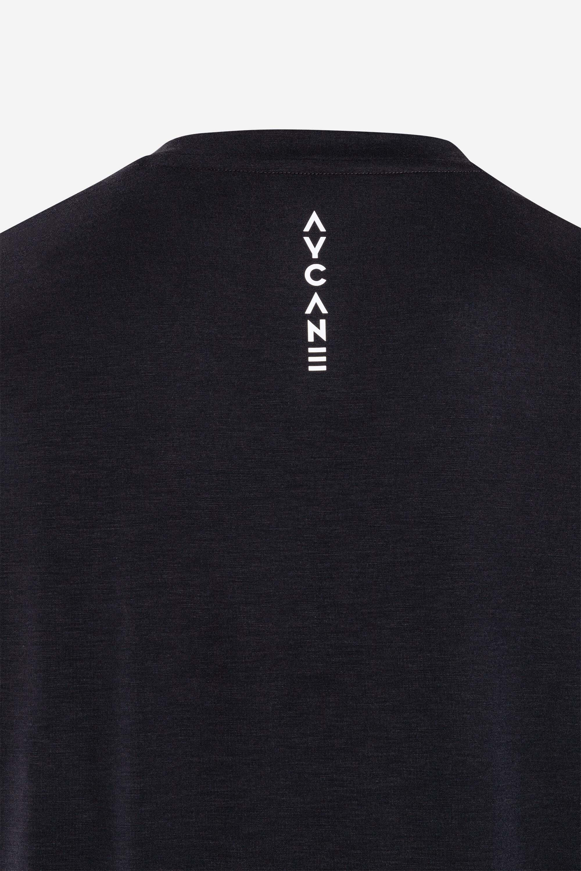 Back view of a black youth t-shirt featuring a white AYCAINE logo for stylish athletic wear.
