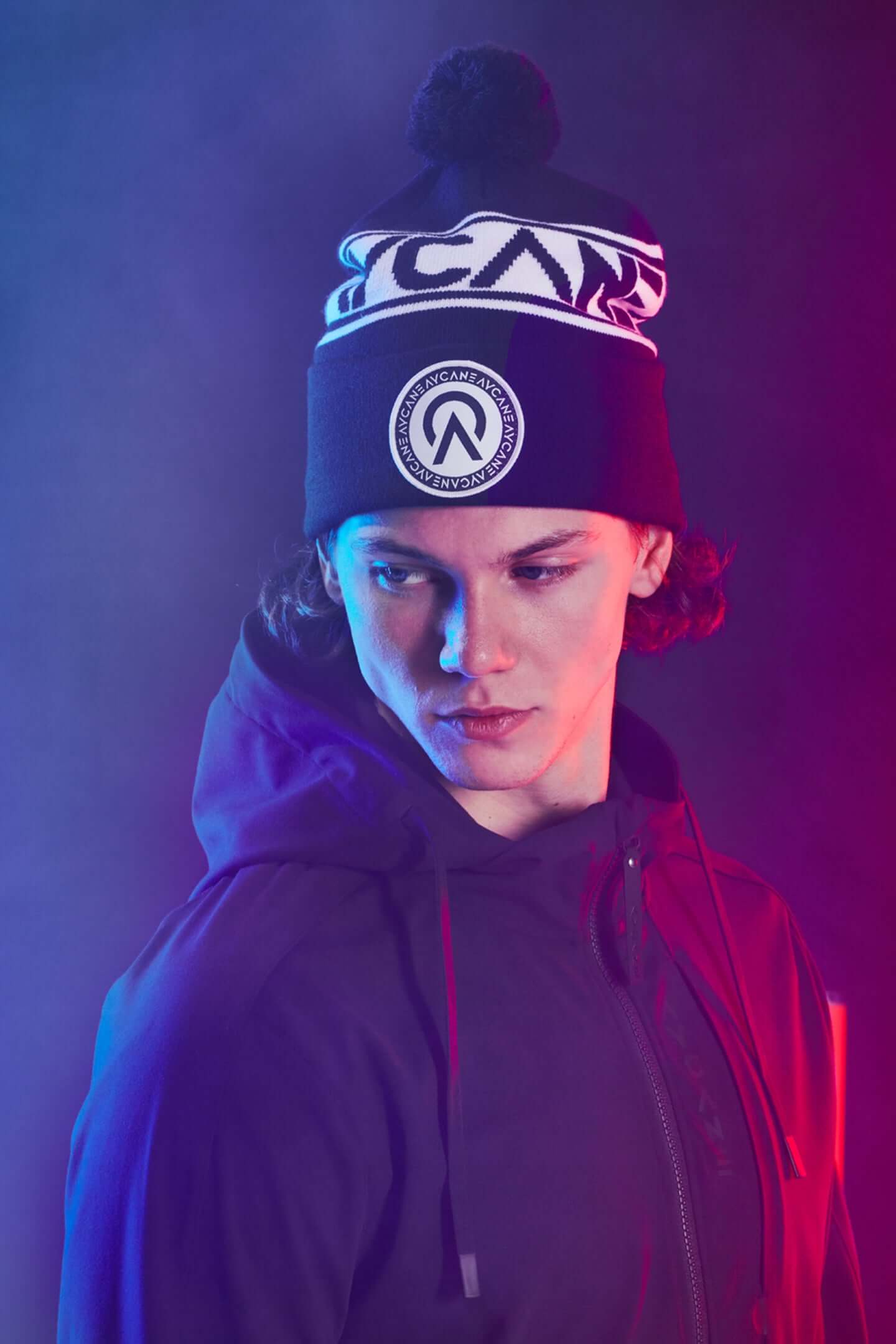 Moritz Seider wearing an AYCANE hockey beanie with pom in black