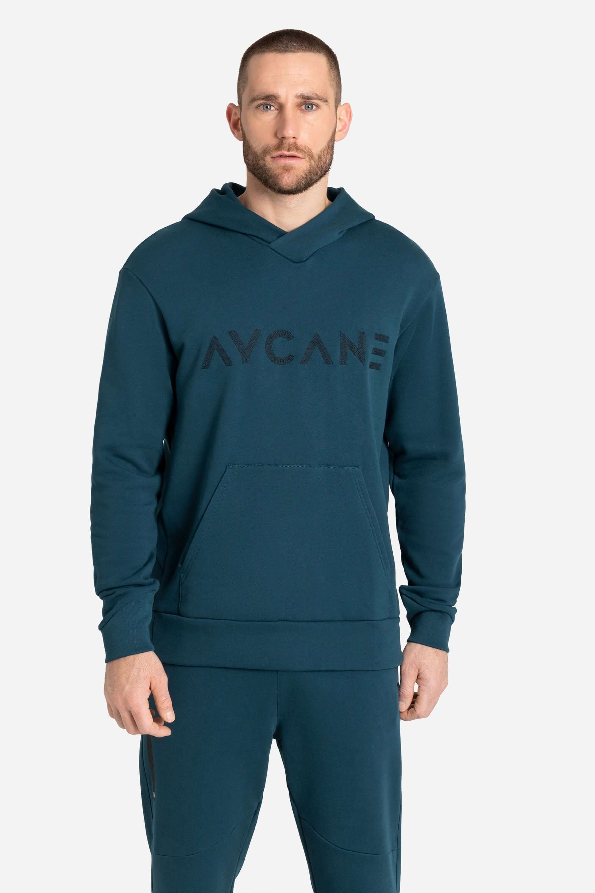 Blue training and leisure hoodie with AYCANE logo in black