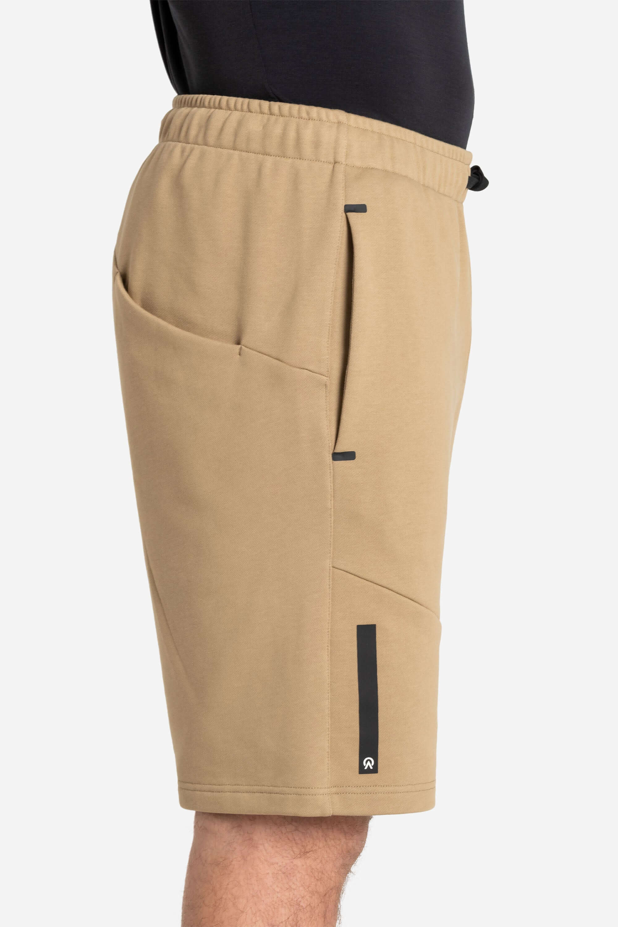 Men with a black training t-shirt and khaki shorts from AYCANE