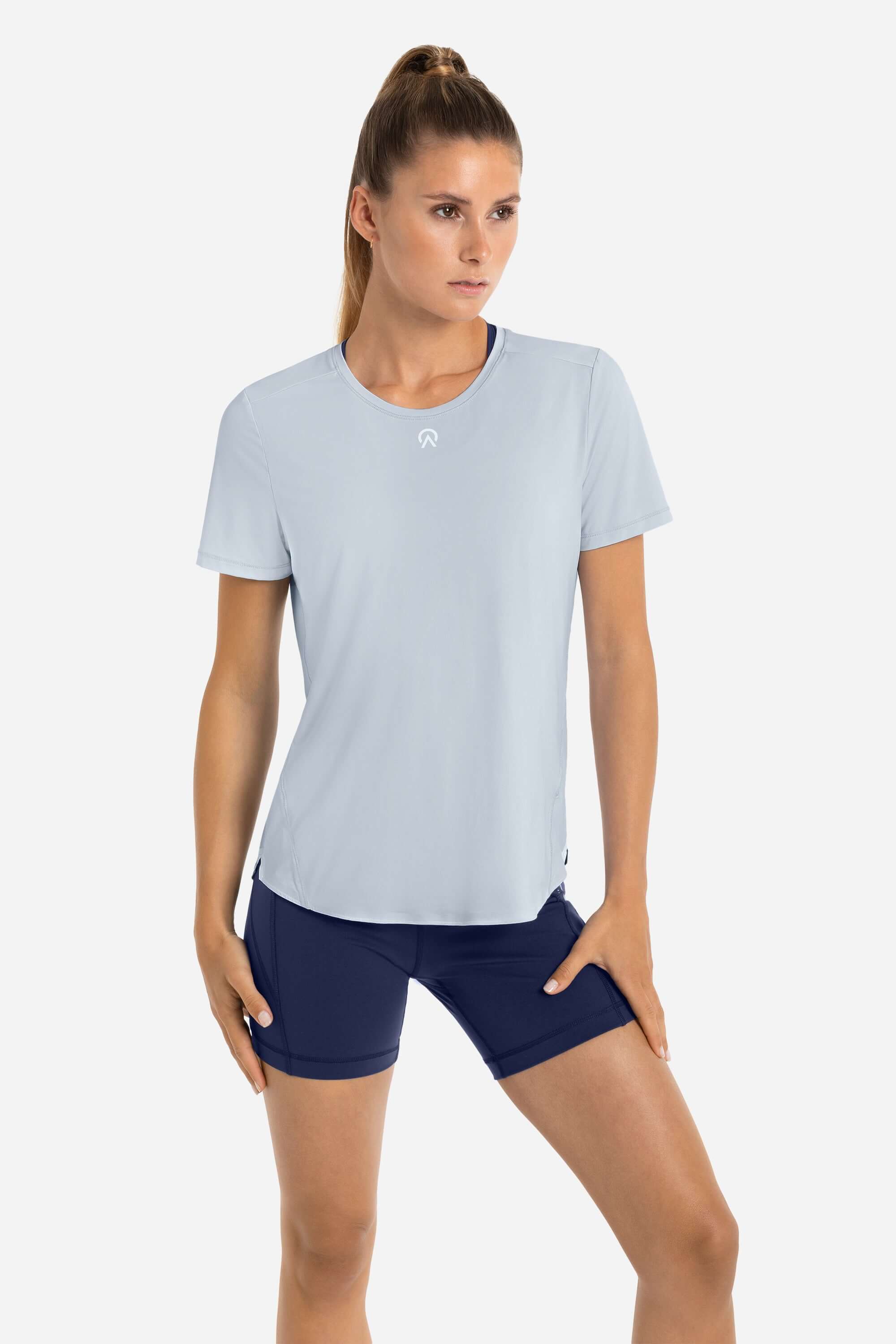 Women wearing a training t-shirt short sleeve in blue with short tights in blue from AYCANE