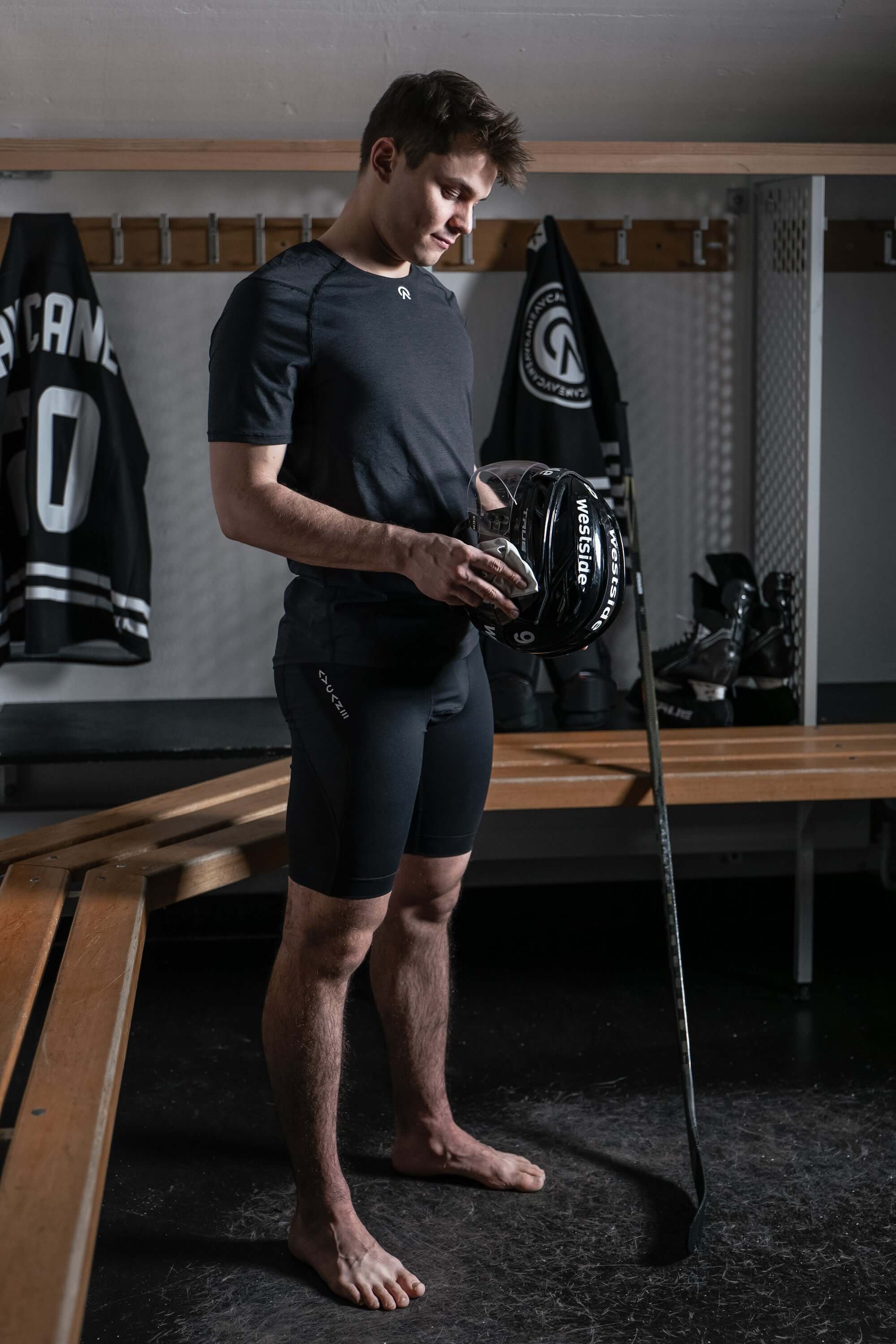 Mika Henauer wearing AYCANE hockey base layer short sleeve t-shirt and shorts in black